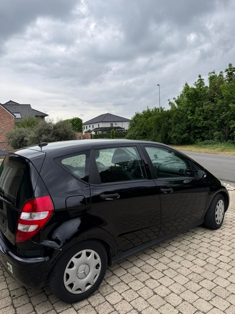 Zwarte Mercedes A 150 benzine/ LPG, Auto's, Mercedes-Benz, Voorwielaandrijving, Stof, Zwart, Zwart