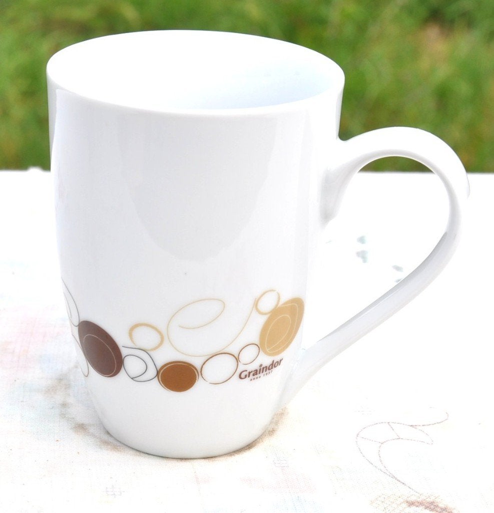 mug neuf publicitaire graindor, Maison & Meubles, Cuisine | Vaisselle, Enlèvement ou Envoi, Neuf, Porcelaine, Mug