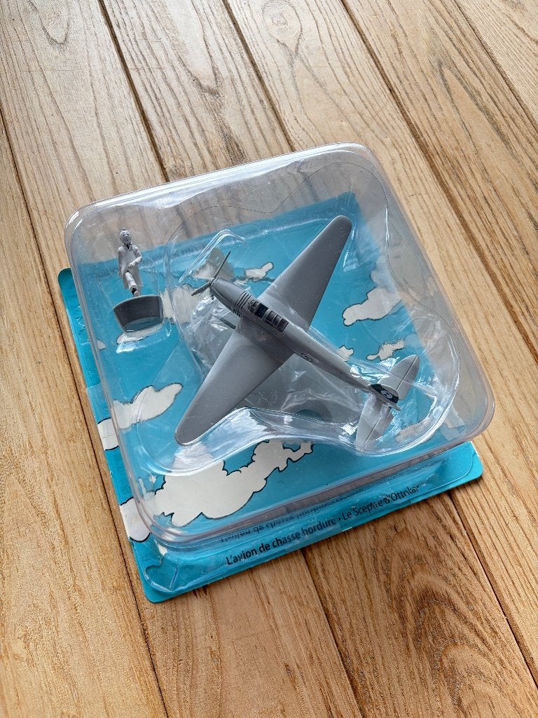 Tintin: L'avion de chasse bordure (version N/B), Collections, Enlèvement ou Envoi, Comme neuf, Autres types