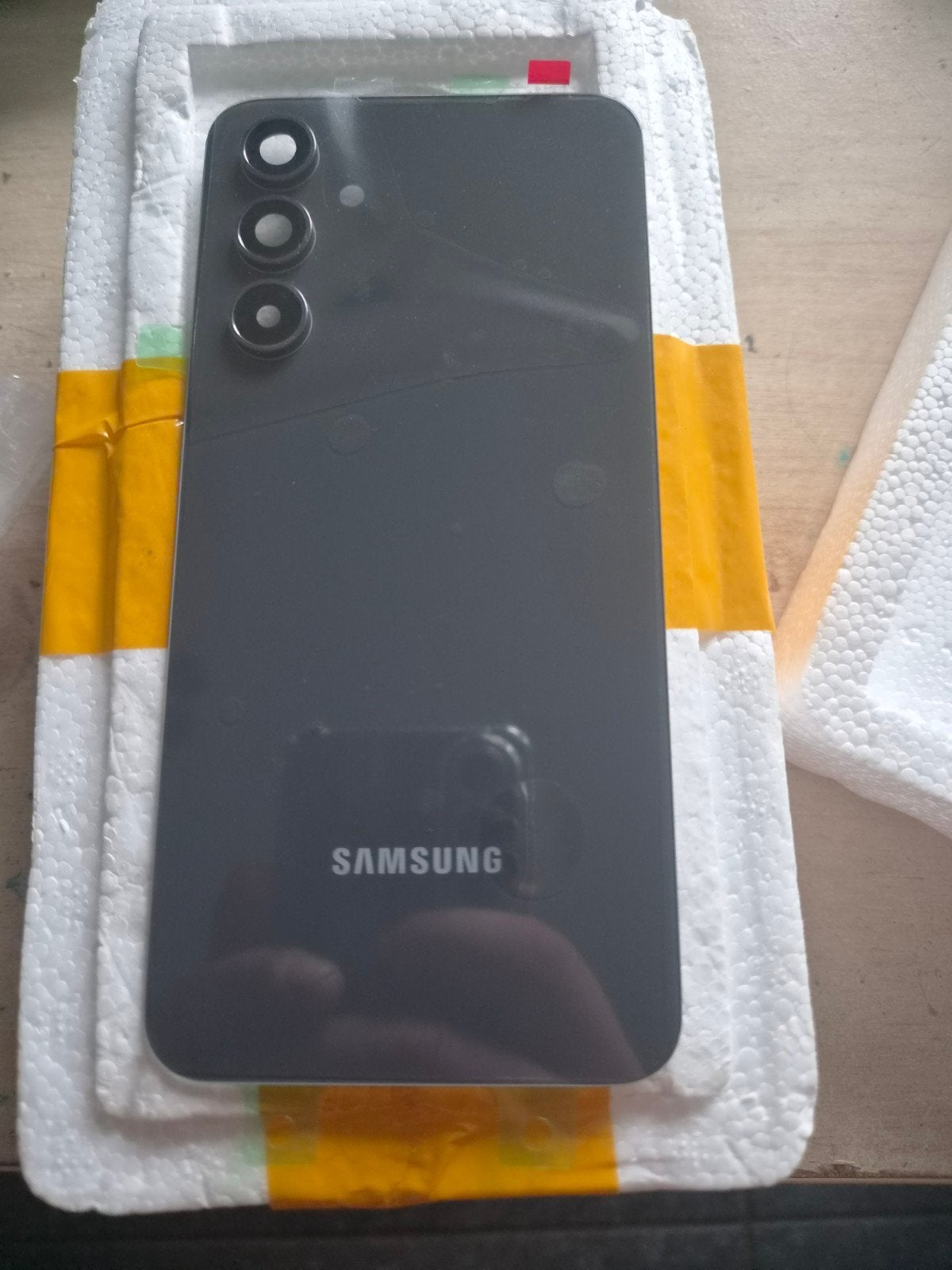 Achterkant galaxy a54, Enlèvement