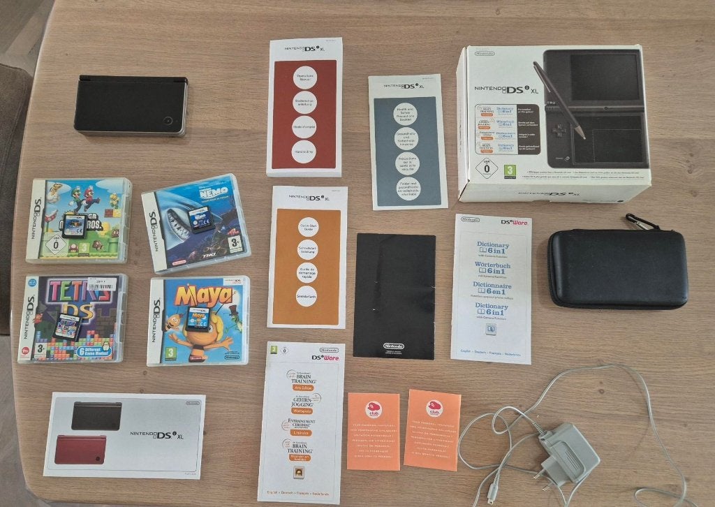 Nitendo DSi XL inclusief originele doos 2010, Games en Spelcomputers, Spelcomputers | Nintendo DS, Gebruikt, Dsi XL, Zwart, Met games