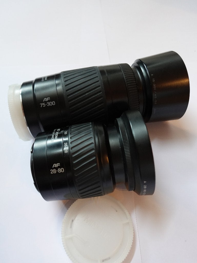 2 Minolta AF Zoomlens+zonnekap+Cokin Skylightfilter - 90 eur, Audio, Tv en Foto, Fotocamera's Analoog, Ophalen, Gebruikt, Spiegelreflex