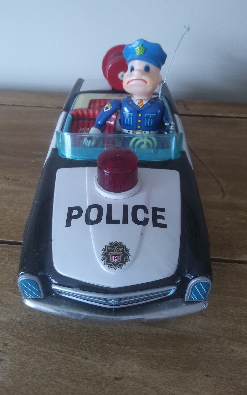 antieke politieauto van plaatstaal, Antiek en Kunst, Ophalen of Verzenden