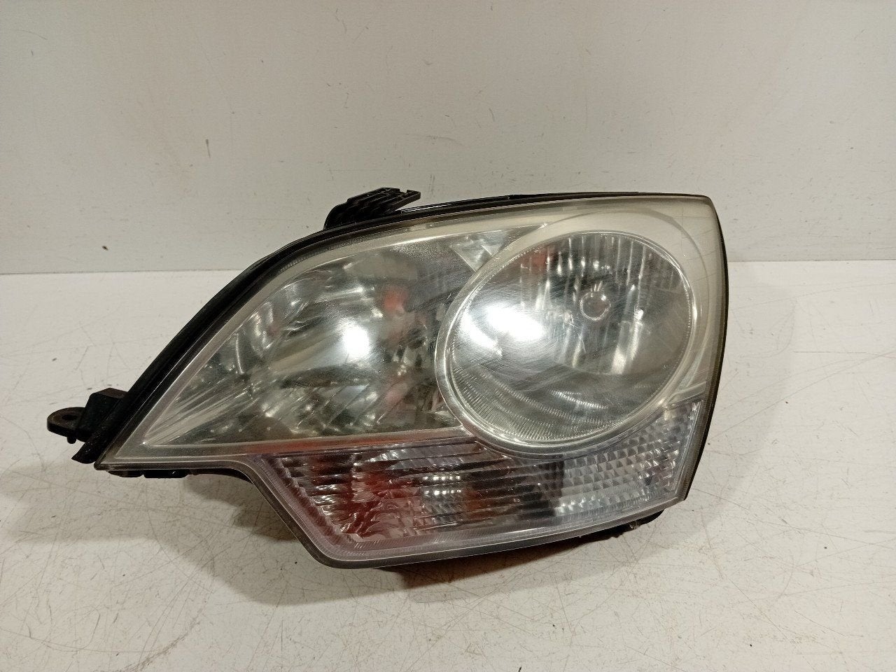 Koplamp links Opel Antara, Auto-onderdelen, Verlichting, Onderdelen@venauto.nl, Van der Ven Autorecycling B.V., Gebruikt, Ettenseweg 76, 4706 PB Roosendaal, The Netherlands