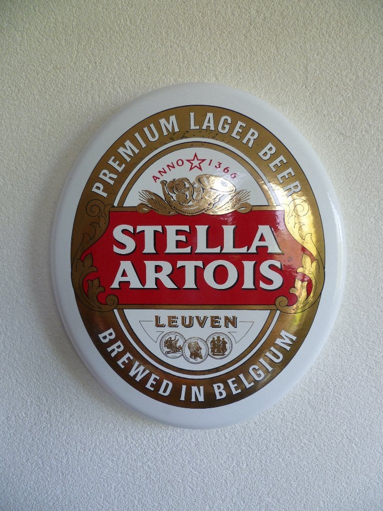 EMAILLE RECLAMEBORD"STELLE ARTOIS LAGER BIER"UIT JAREN 80/90, Enlèvement ou Envoi, Comme neuf, Panneau publicitaire