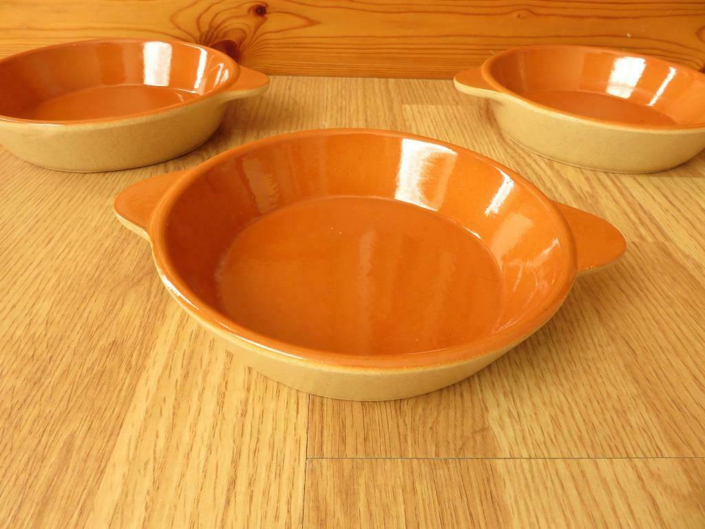 4 superbes plat a gratin Emile Henry France, Huis en Inrichting, Keuken | Servies, Ophalen of Verzenden, Zo goed als nieuw, Kom(men)