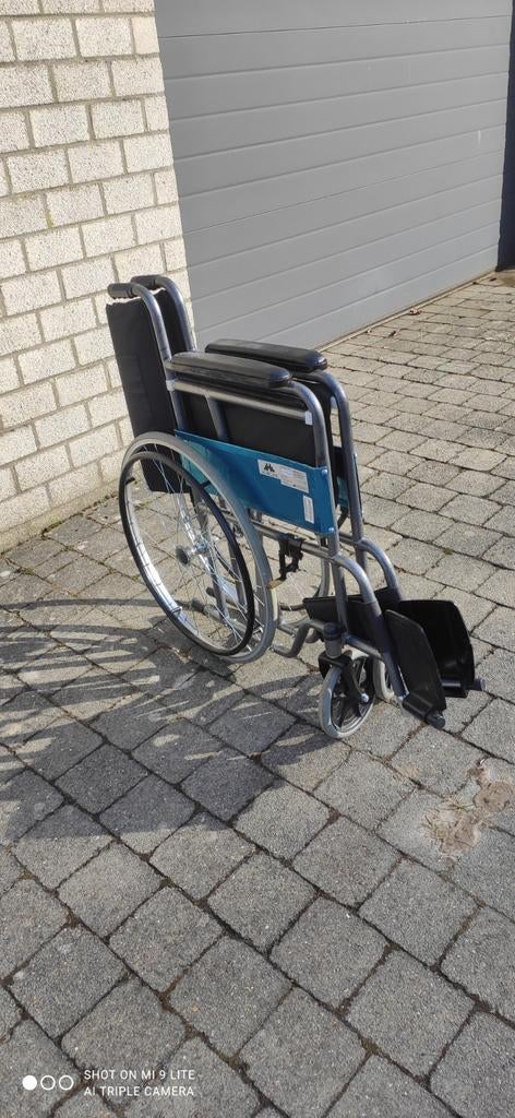 Chaise roulante pour personnes a mobilité réduite, Enlèvement