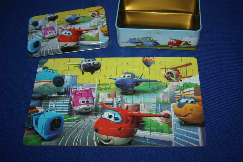 Super Wings Blik met puzzel in ( komt uit china ) als nieuw, Enlèvement ou Envoi, Plus de 50 pièces, Comme neuf, 2 à 4 ans