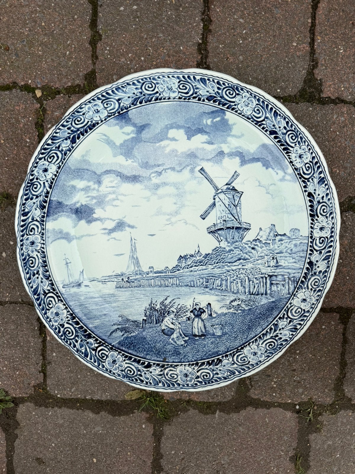 Delfts blauw wandbord, Ophalen