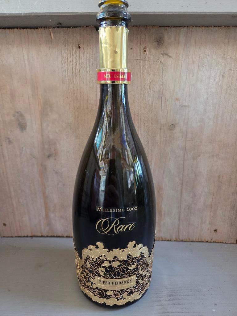 Piper heidsieck 2002 rare (leeg), Enlèvement