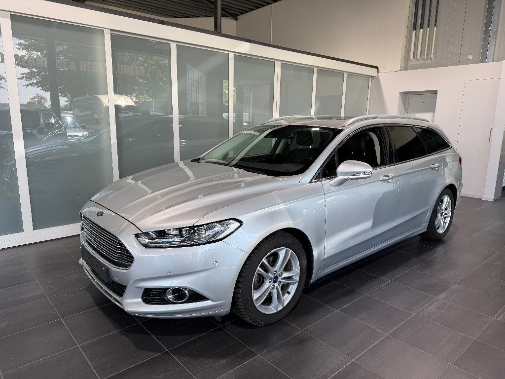 Ford Mondeo 1.5 EcoBoost Titanium / AUTOMAAT / 12 M GARANTIE, 4 cilinders, Mondeo, Alcantara, Lichtsensor