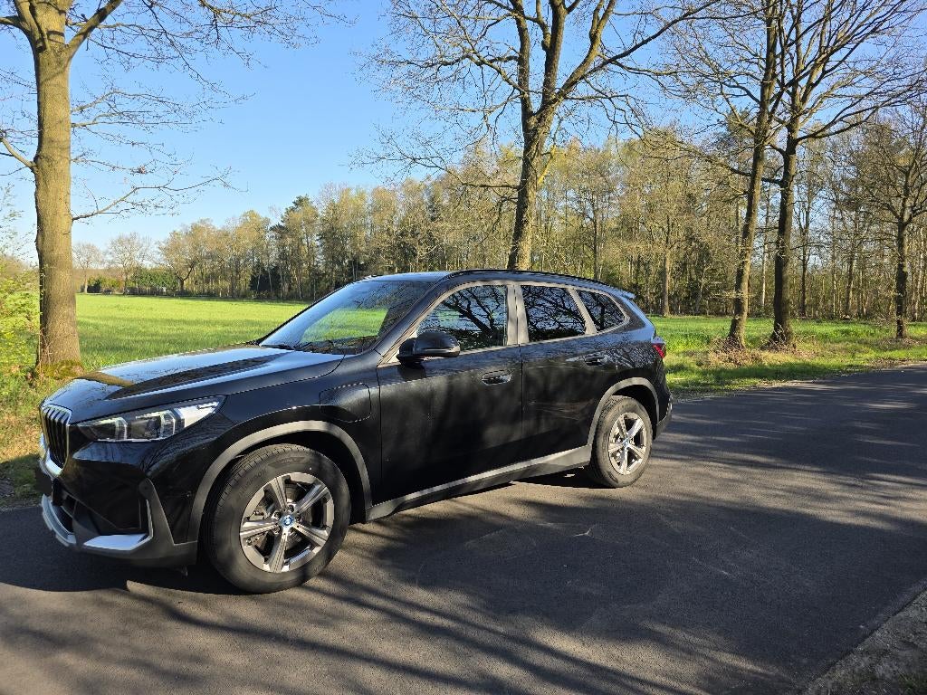 BMW X1xDrive25e 4WD Hybride, Auto's, Stof, Zwart, 5 zetels, 1930 kg