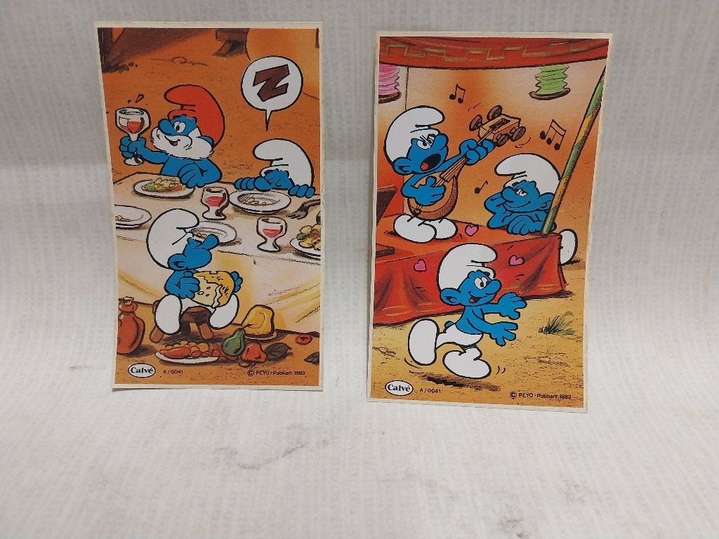 2 autocollants Schtroumpfs Peyo Calvé 1983, Enlèvement ou Envoi, Utilisé, Bande dessinée ou Dessin animé