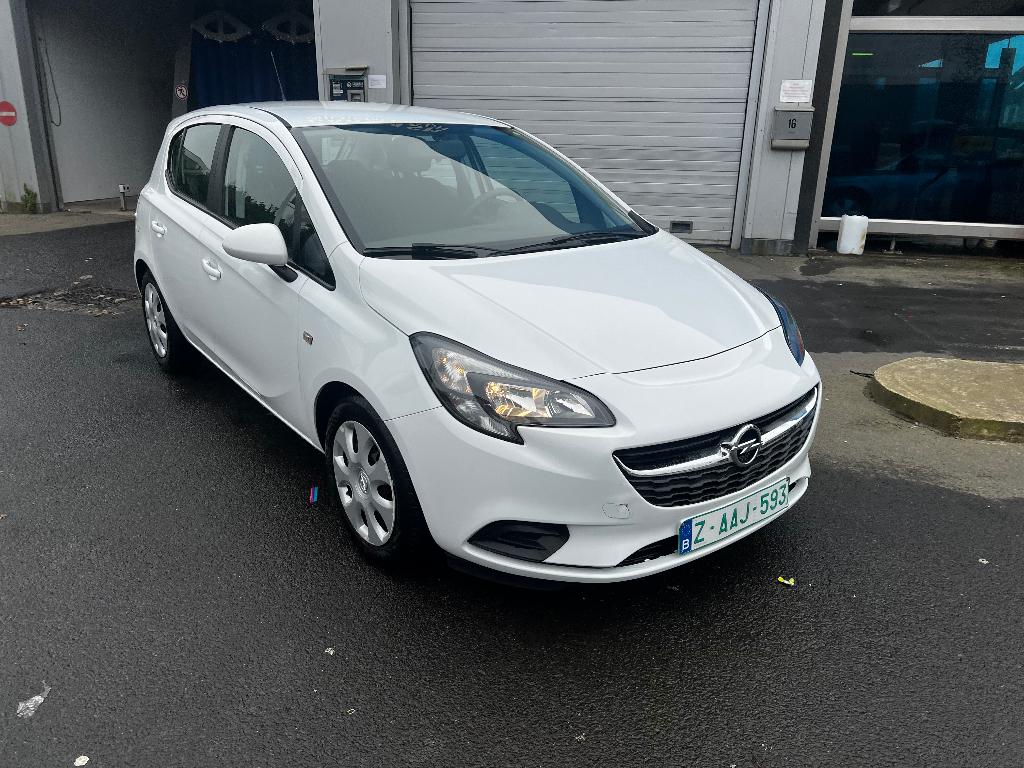 opel corsa met 57000 km met airco en garantie 061826 nr, Auto's, Voorwielaandrijving, Stof, Euro 6, 4 cilinders