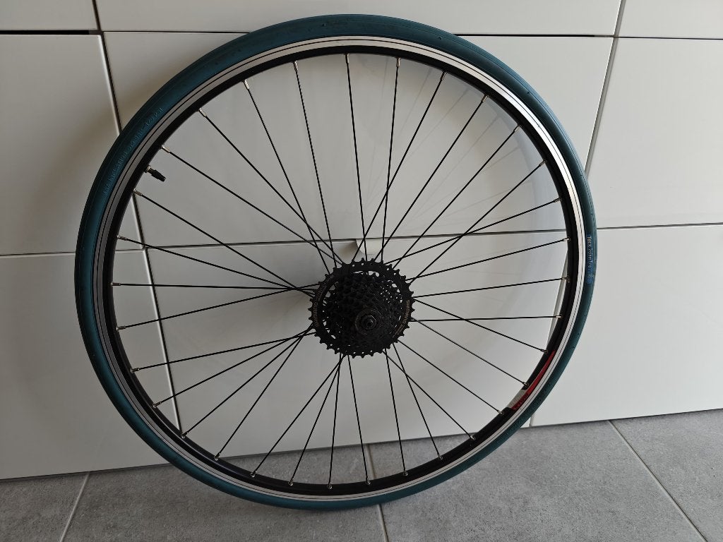 Indoor trainerband + wiel + nieuwe shimano cassette, Vélos & Vélomoteurs, Vélos Pièces, Enlèvement ou Envoi, Comme neuf, Roue