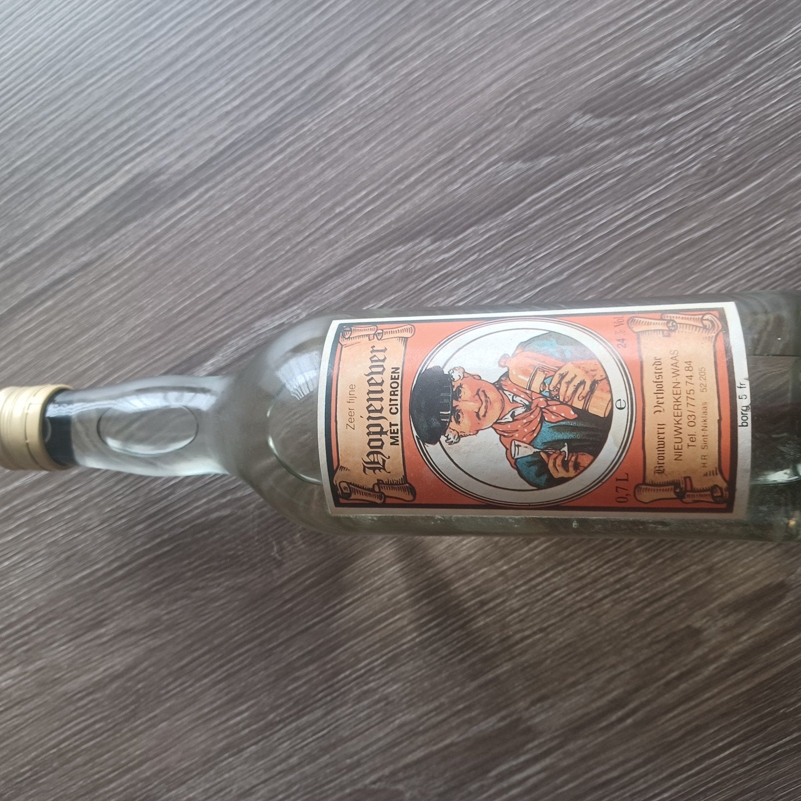 Oude fles hopjenever met citroen van brouwerij Verhofstede, Verzamelen, Wijnen, Ophalen