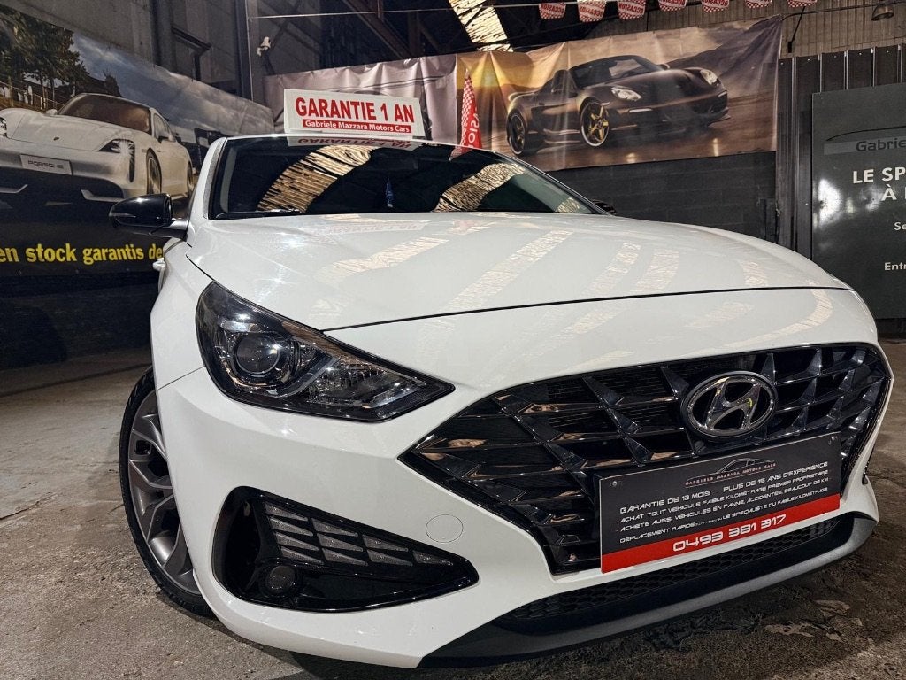 Hyundai i30 1.0 CarPlay LED-PDC-camera met hybride cockpit, Euro 6, Wit, Leder, Handgeschakeld