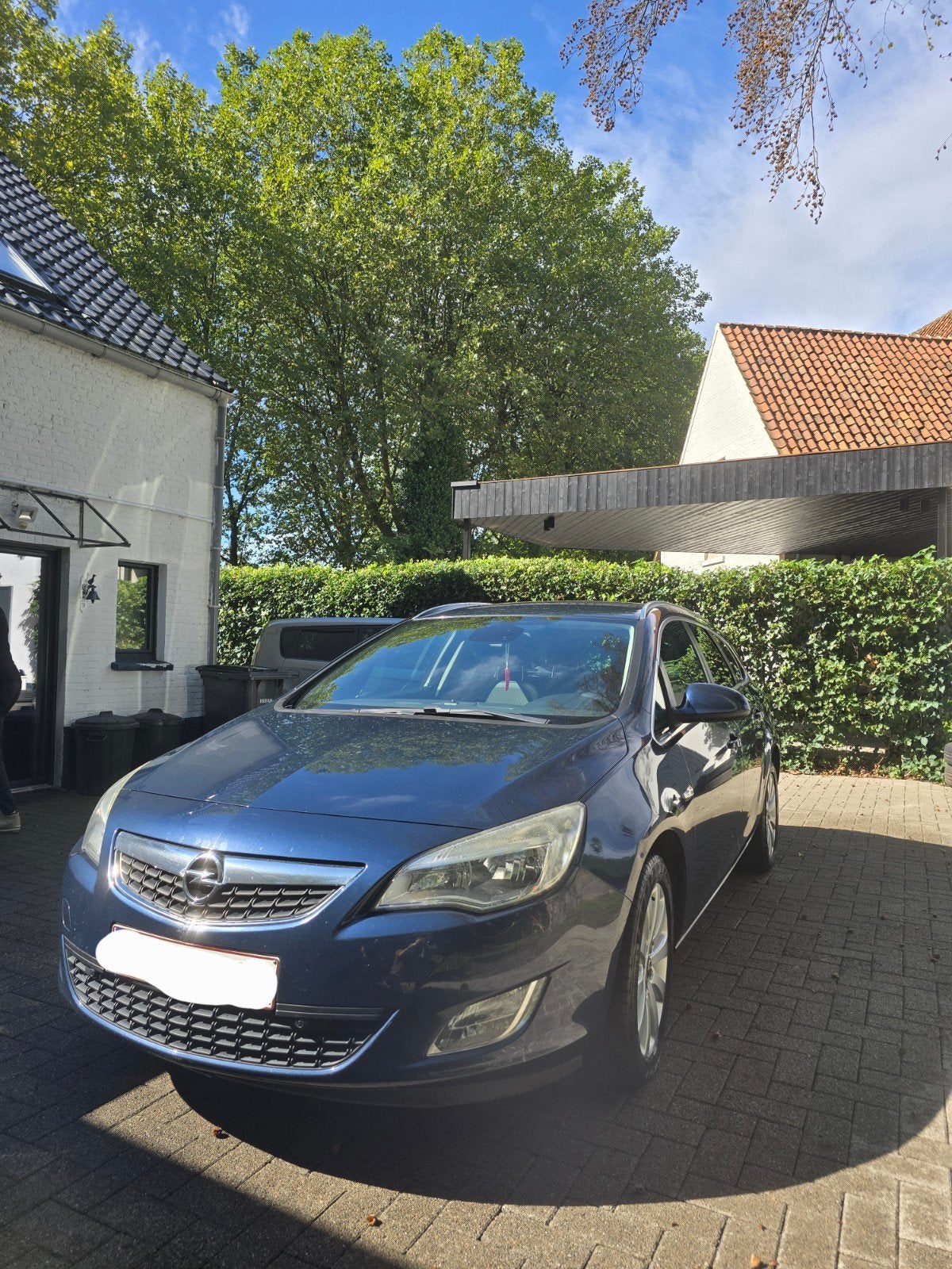 Opel Astra 1.7 CDTI Sports Tourer, Auto's, Voorwielaandrijving, Euro 5, Zwart, Blauw
