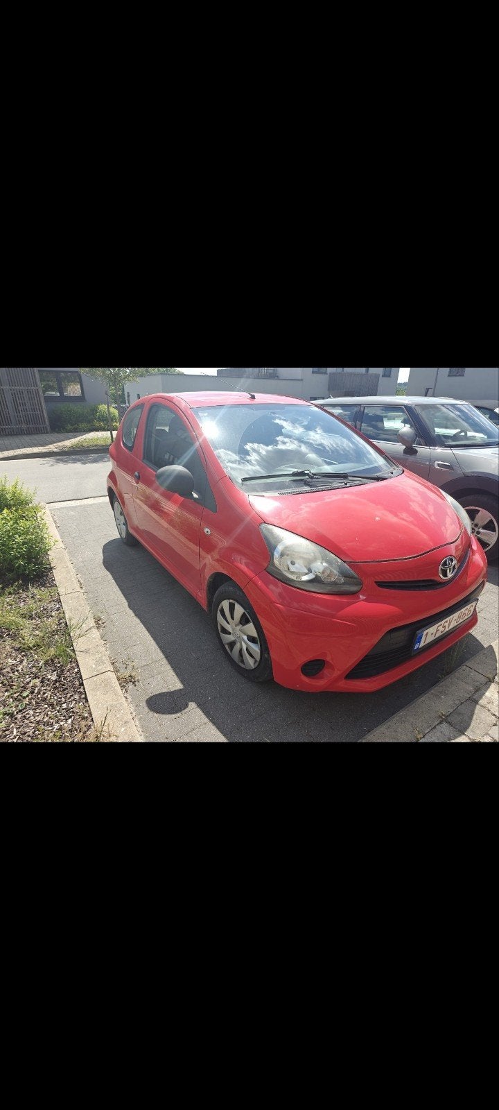 Toyota Aygo slechts 11000 km, Auto's, Euro 5, Stof, Zwart, Berline