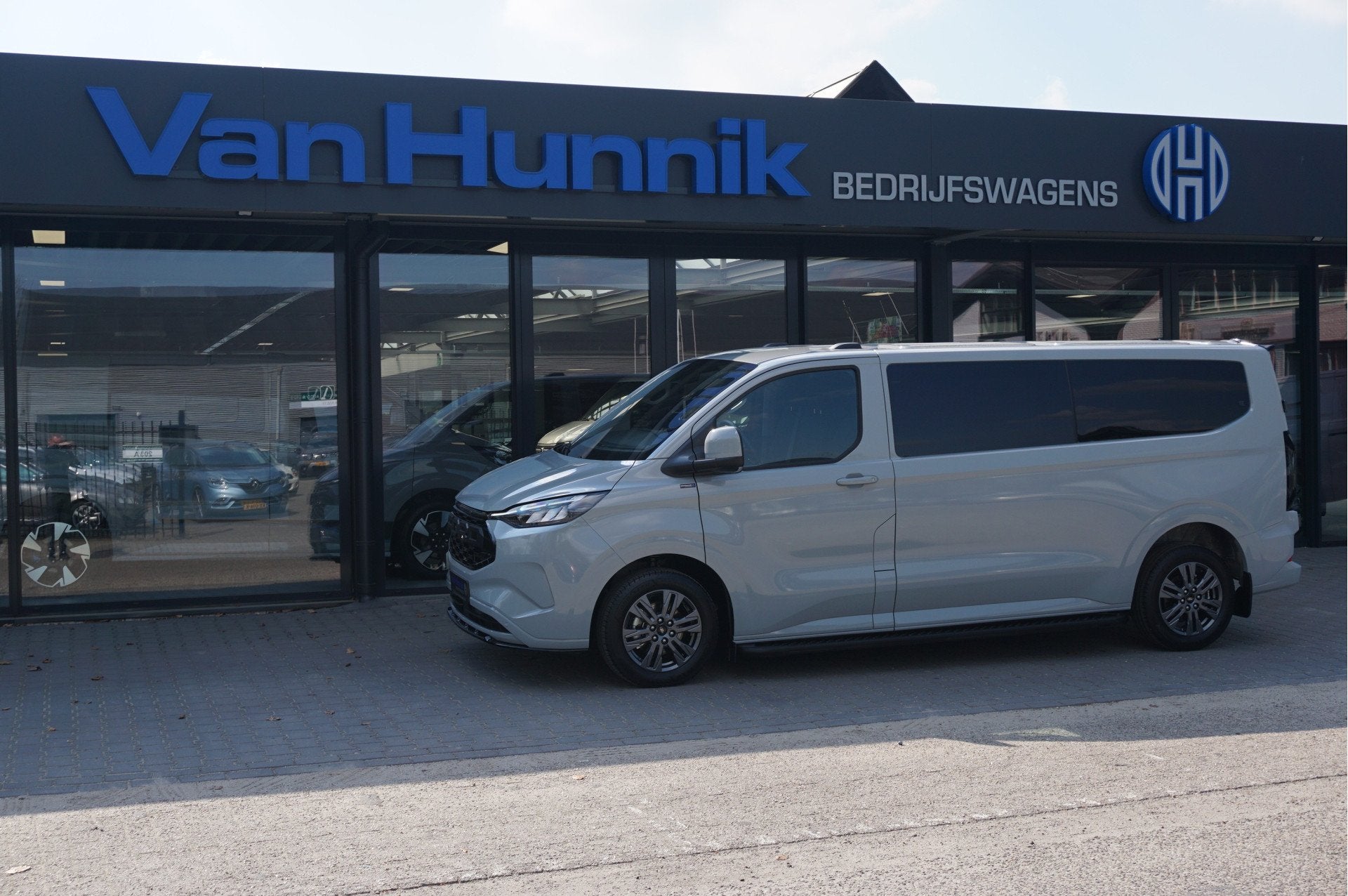 Ford Transit Custom 320L 2.5 PHEV 233PK Dubbel Cabine JWR Ed, Auto's, Gebruikt, Bedrijf, Hybride Elektrisch/Benzine, Ford