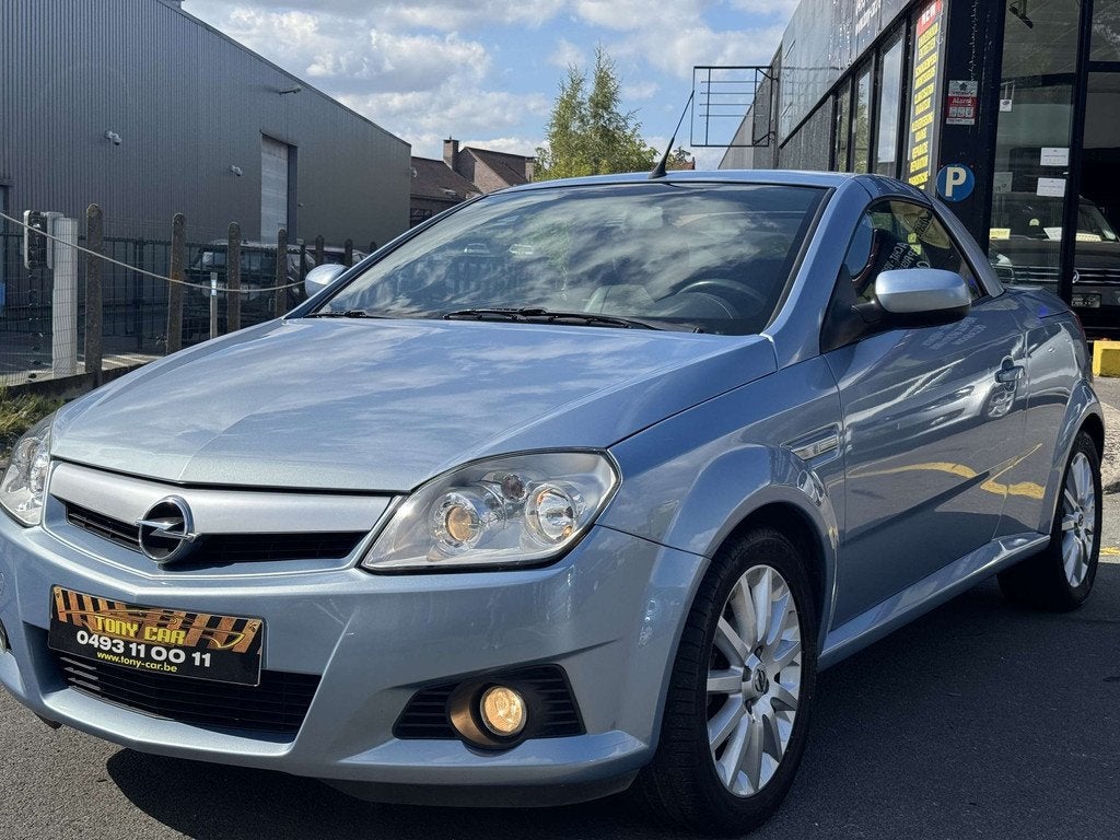 Opel Tigra Tigra Twintop 1.4i XEP 16v Cosmo (bj 2005), Voorwielaandrijving, Gebruikt, Zwart, 4 cilinders