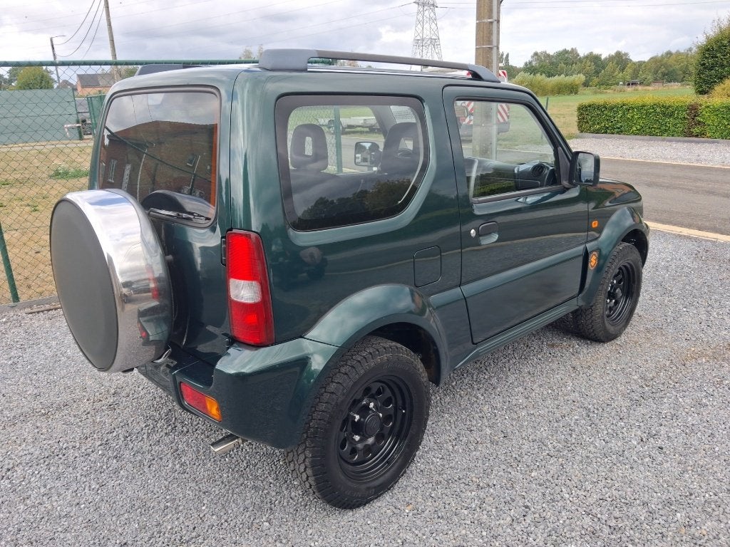 suzuki jimny #4x4# 1300cc benzine !!bj 2006!! 128 000km, Auto's, 4 zetels, Stof, Zwart, Bedrijf