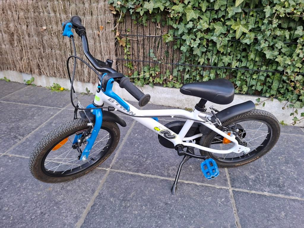 Kinderfiets jongen btwin blauw/wit, Ophalen