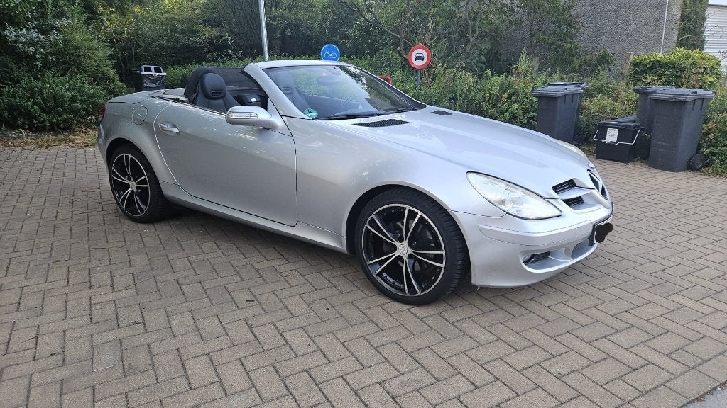 SLK200 KOMPRESSOR Aut. Airscarf,airco,leer,navi,, Auto's, Dealer onderhouden, Achterwielaandrijving, 4 cilinders, Cabriolet