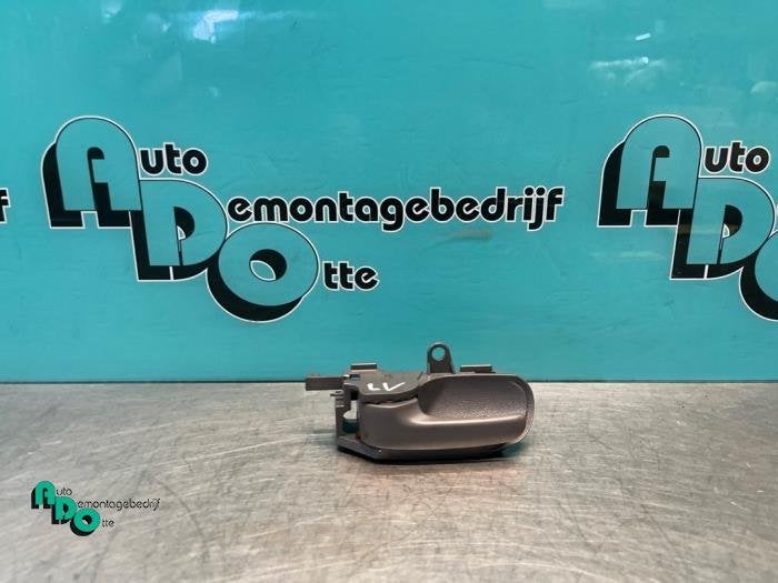 Poignée portière 4portes avant gauche d'un Toyota Aygo (Ay, -, 3 mois de garantie, Toyota, Utilisé