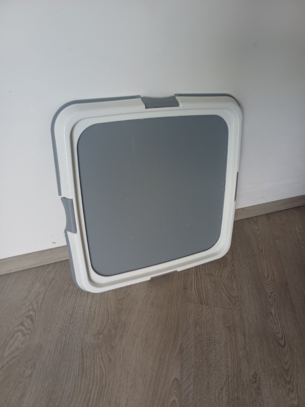 Puppy plas mat houder, Enlèvement