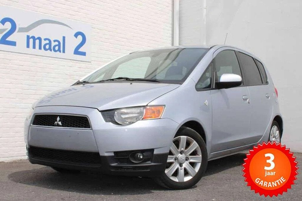 Mitsubishi Colt 1.3i Airco/Cruise Inclusief 3 JAAR garantie!, Auto's, Mitsubishi, Euro 5, Gebruikt, Zwart, 4 cilinders