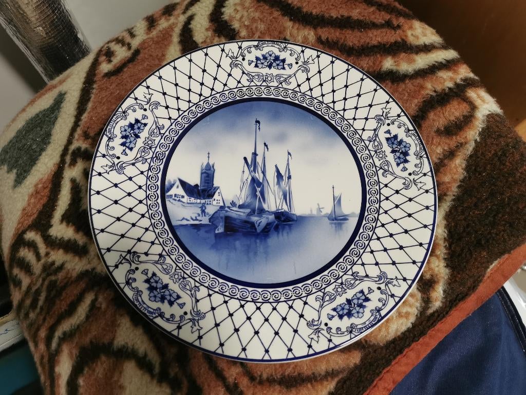 Assiette murale, Ophalen