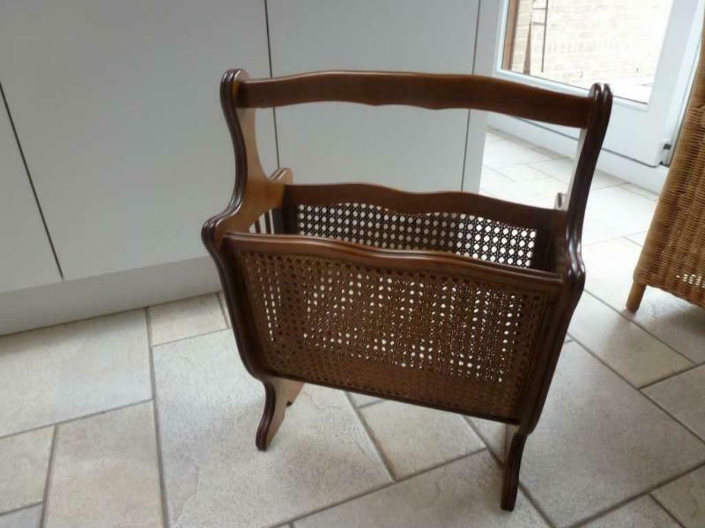 houten dagbladhouder, Ophalen