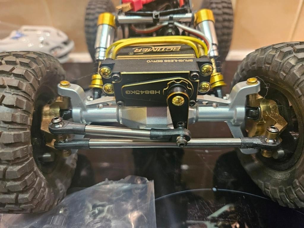 axial utb18, Hobby en Vrije tijd, Auto offroad, Zo goed als nieuw, Schaal 1:16, Ophalen