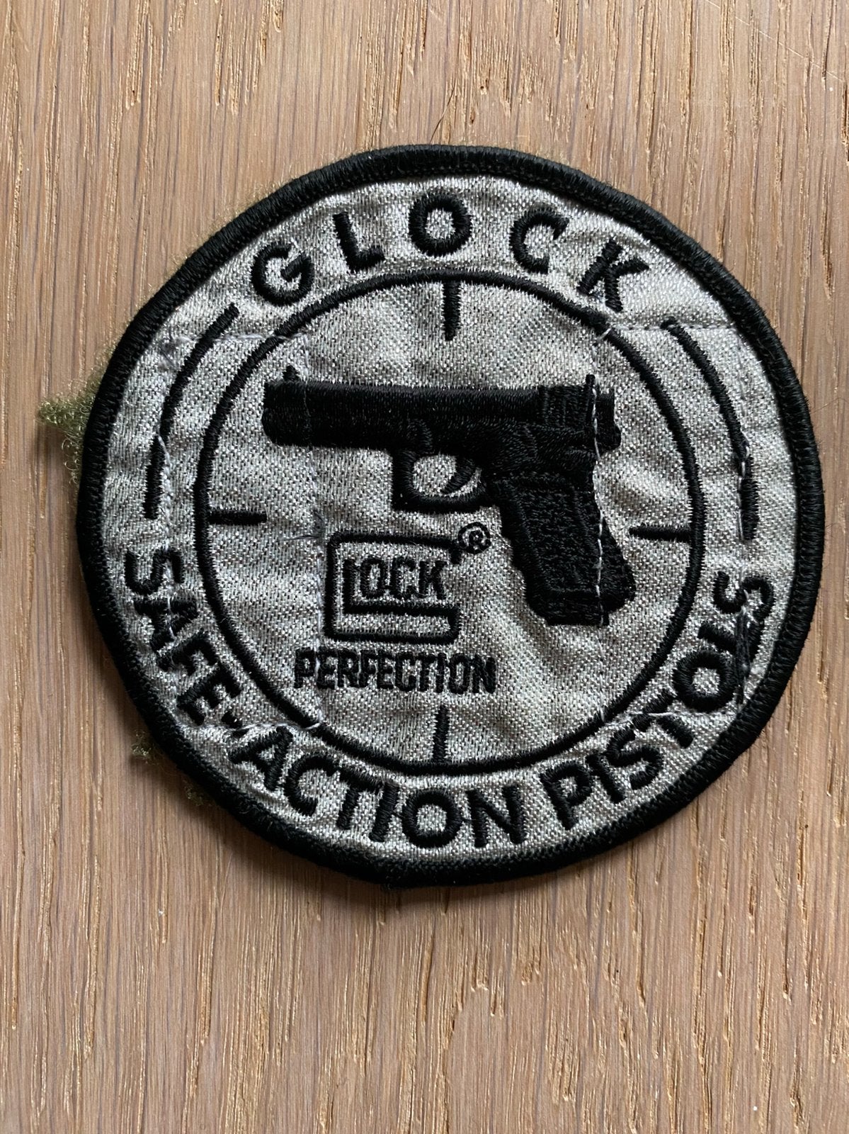 Glock - Lock Perfection, Ophalen of Verzenden, Overige soorten, Embleem of Badge