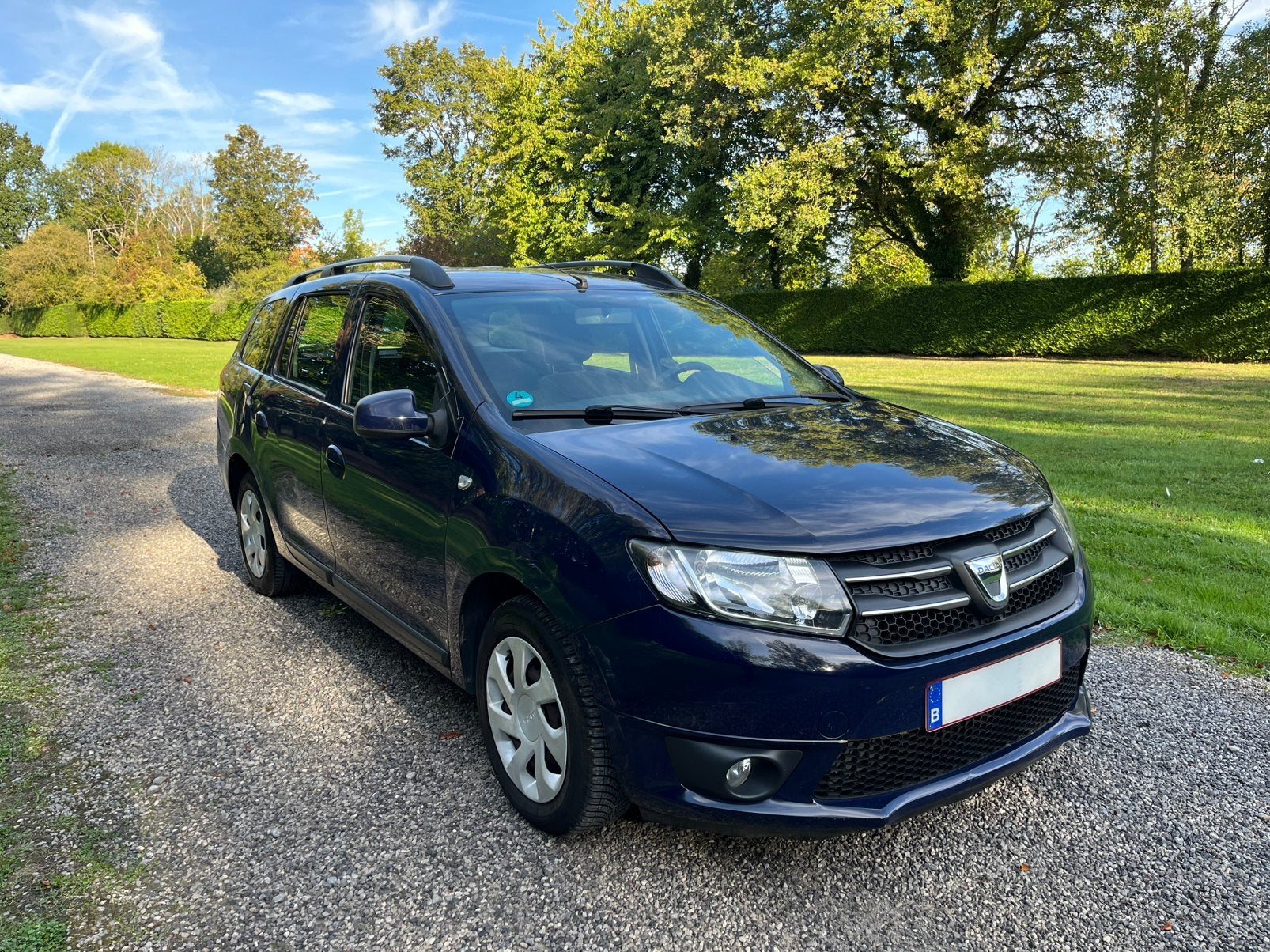 DACIA LOGAN 1.5DCI LAURATE/AIRCO/GPS/CRUISE, Auto's, Voorwielaandrijving, Euro 5, Stof, Zwart