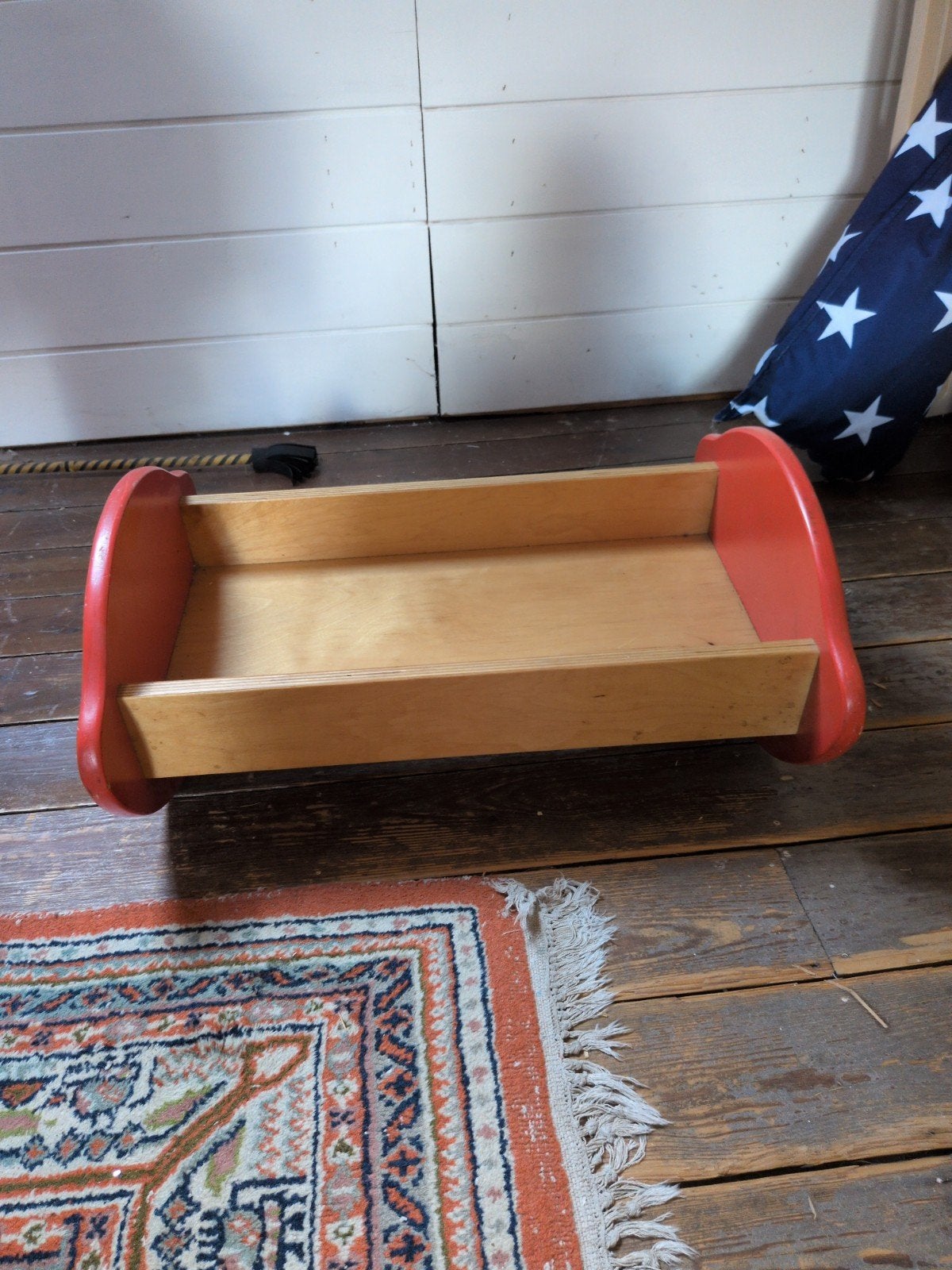 houten poppenbedje, Ophalen