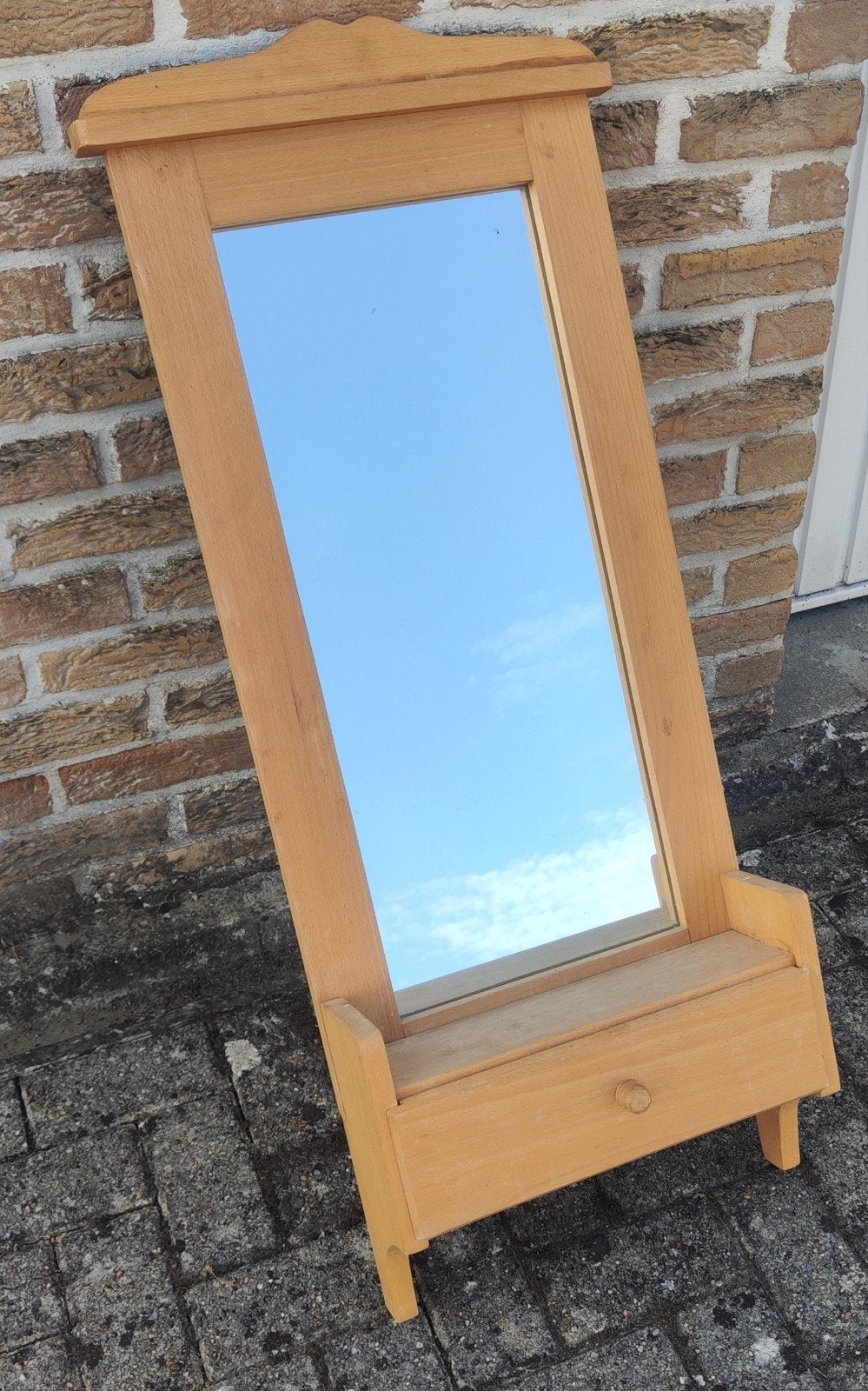 Houten spiegel met lade, Enlèvement