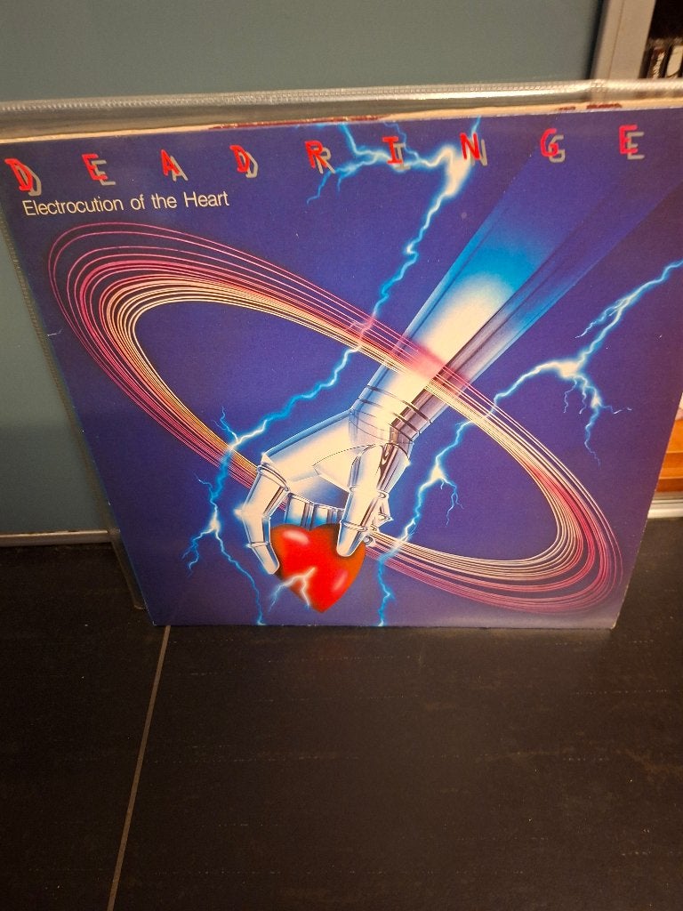 lp - deadringer - electrocution of the heart - bak 6, Enlèvement ou Envoi, Comme neuf, Hard rock, Pochette photo