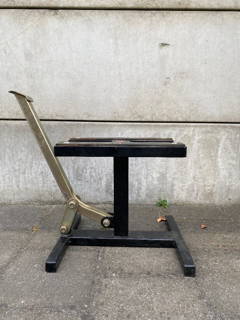 Motorstandaard bandenwisselaar hefttafel, Ophalen