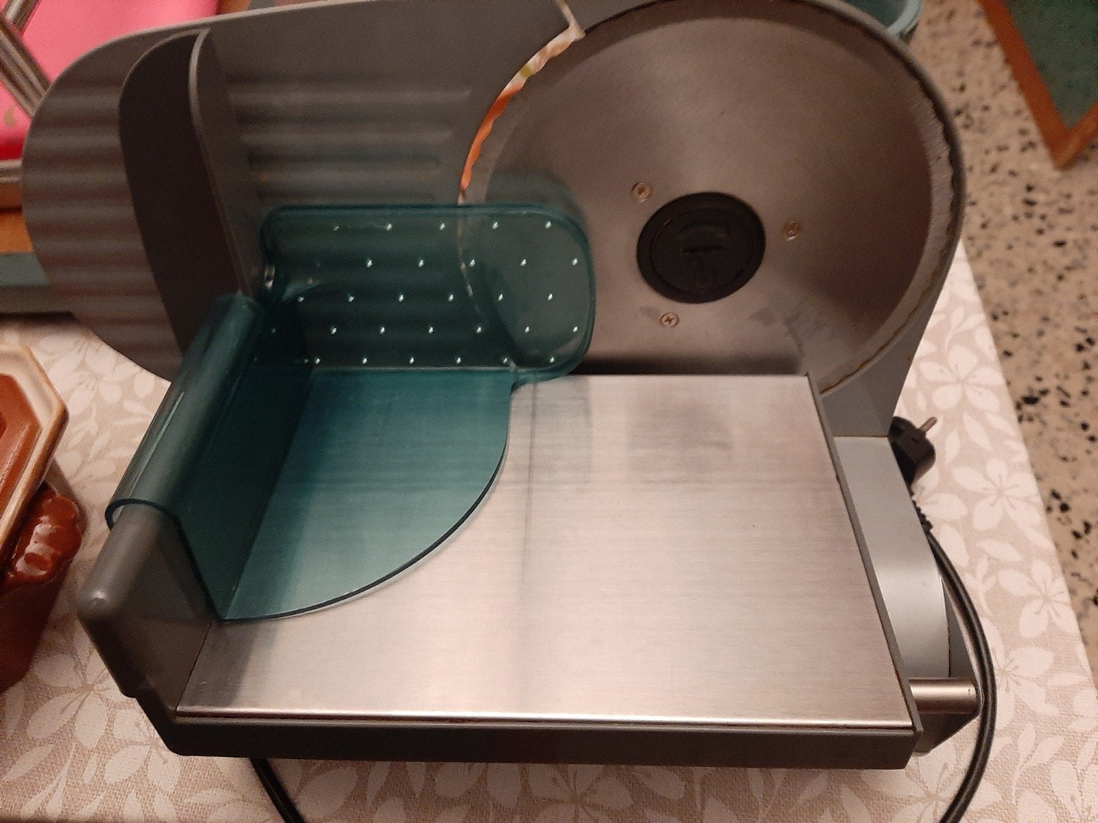 Snijmachine Domo, Ophalen