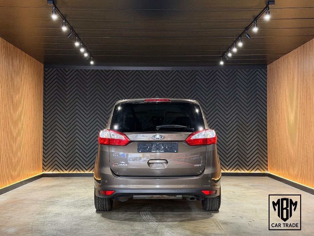 ✅Ford Grand C-Max 1.5 EcoBoost GARANTIE Navi Leer Z.verw PDC, Auto's, Dealer onderhouden, Monovolume, 1498 cc, 4 cilinders
