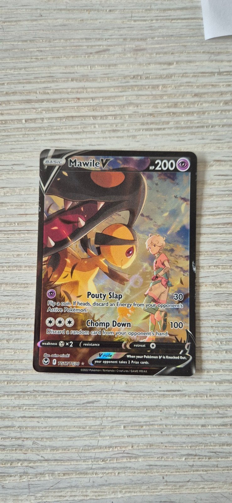 pokemonkaart mawile V, Enlèvement