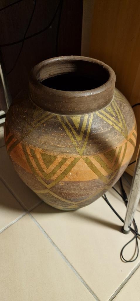 Oude pot uit Afrika, Ophalen