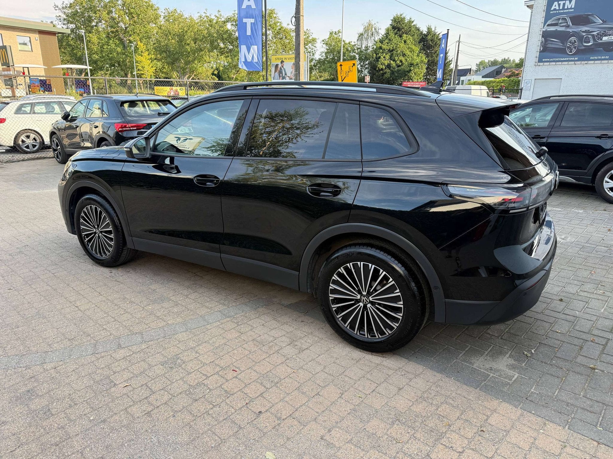 Volkswagen Tiguan Tiguan 1.5 eTSI mHEV ACT BLACK EDITION OPF, Auto's, Zwart, 4 cilinders, Zwart, 5 zetels