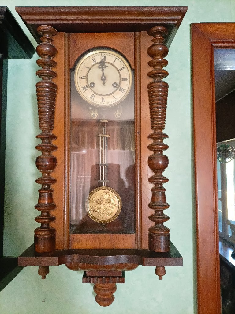 antieke klok met slinger, Ophalen