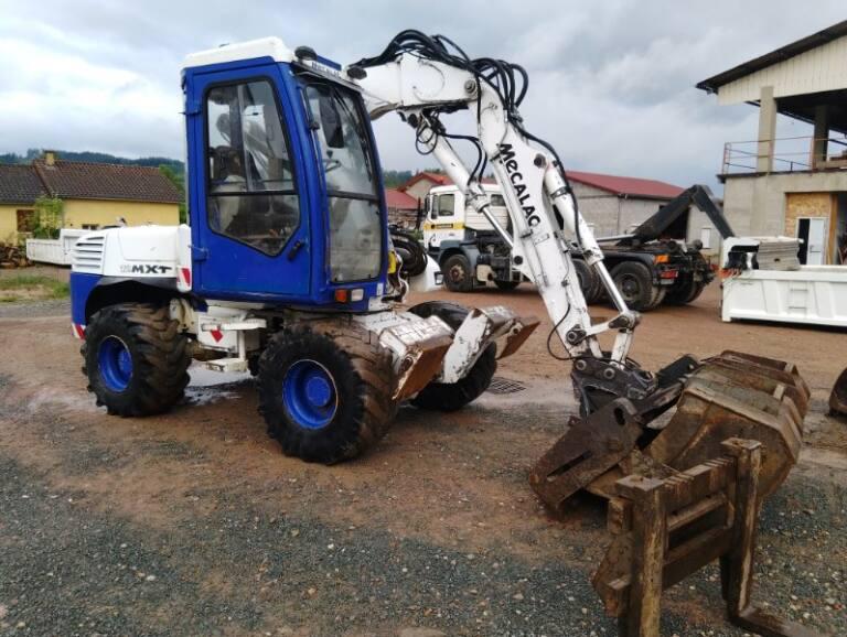 Pelle sur pneus mecalac 12 mxt, Enlèvement