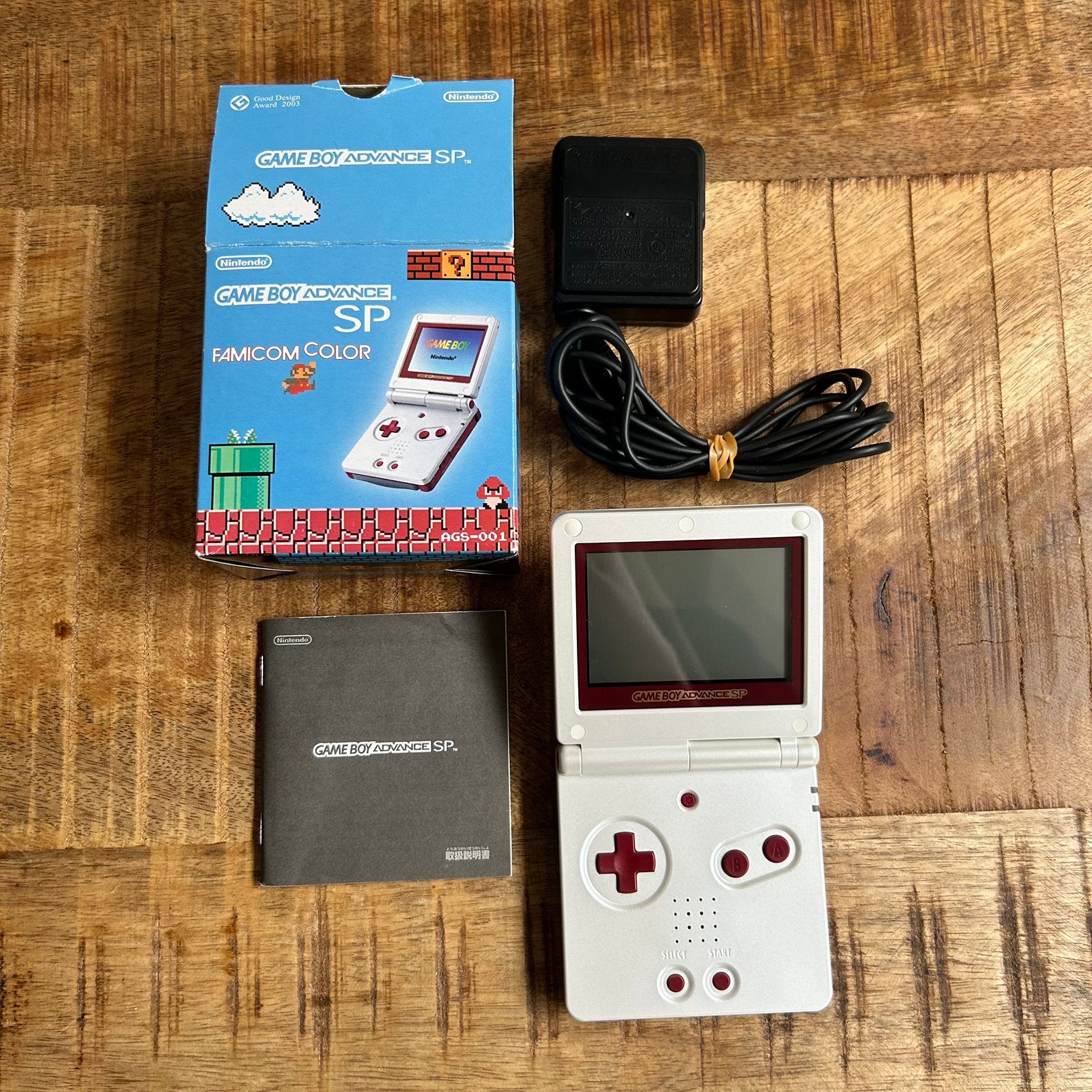 Nintendo Game Boy Advance SP Famicom Color in originele doos, Games en Spelcomputers, Ophalen of Verzenden, Zo goed als nieuw