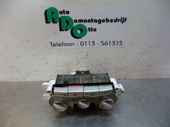 Kachel Bedieningspaneel van een Daihatsu Sirion (Sirion 2 05, Auto-onderdelen, Dashboard en Schakelaars, Daihatsu, Gebruikt, 3 maanden garantie