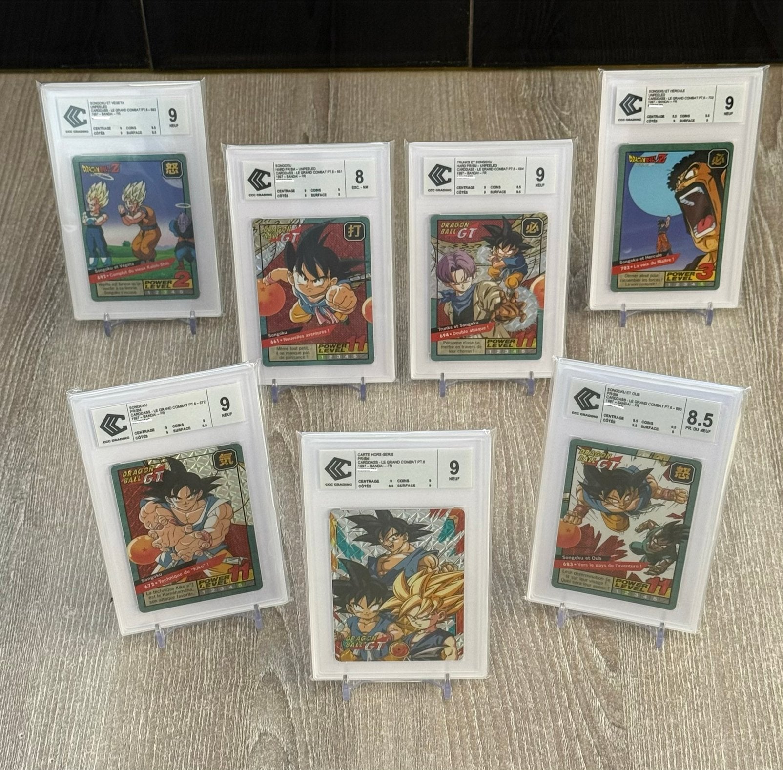 Set van 7 gegradeerde Dragon Ball z-kaarten, Verzenden, Zo goed als nieuw, Booster
